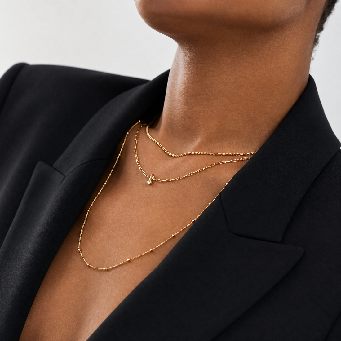 How to Layer Gold Necklaces Like a Stylist for an Effortlessly Elegant Look